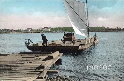 Lautta Tornion joella, taustalla taajama 