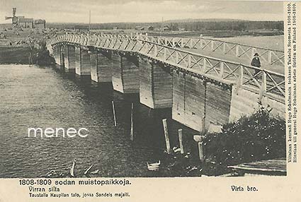 Virran silta. Taustalla Kaupilan talo, jossa Sandels majaili 